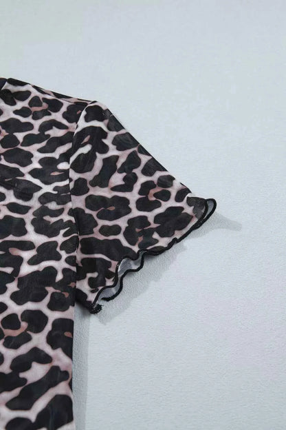 Leopard print sheer mesh top for women, stylish and versatile, featuring a chic design perfect for casual or dressy looks.