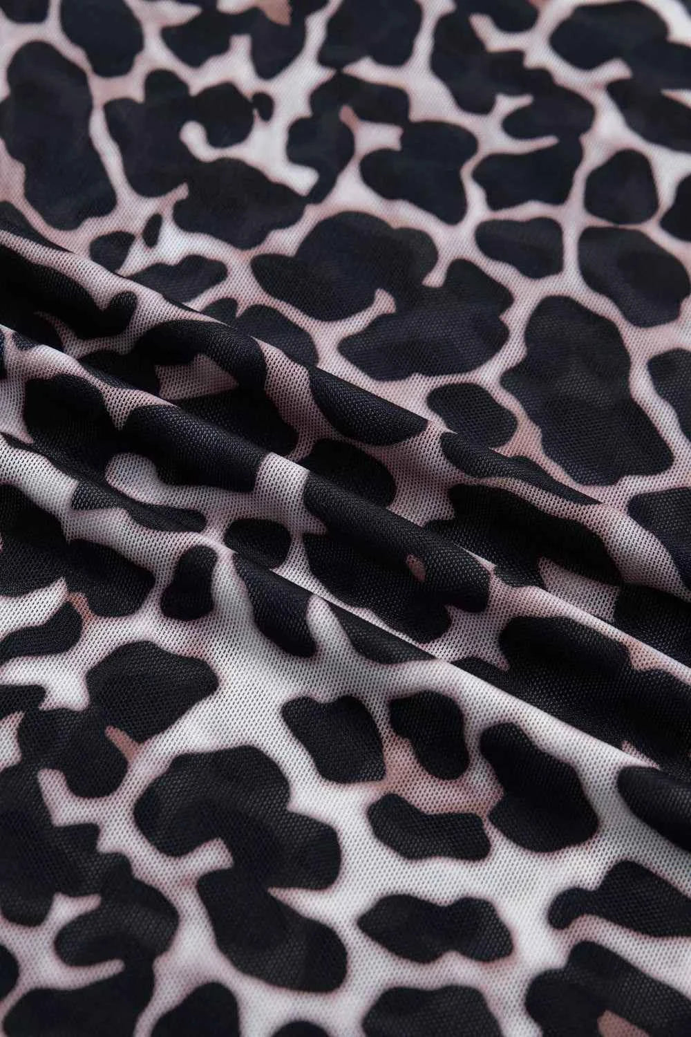 Leopard print sheer mesh top for women, trendy and versatile, featuring chic leopard design perfect for stylish outfits.