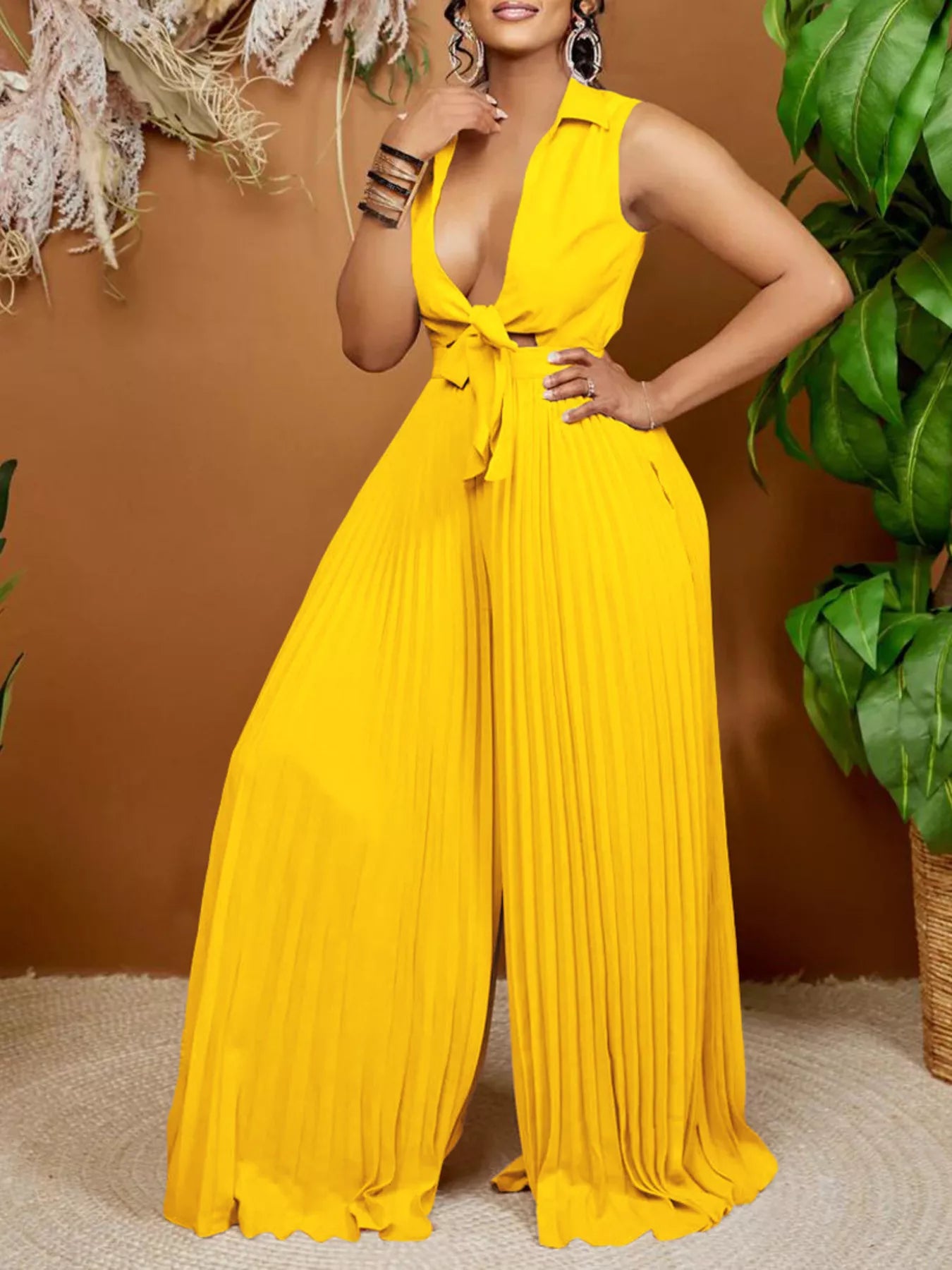 Yellow plus size tie-front pleated wide-leg jumpsuit by Trendsi, featuring a full-length design and stylish silhouette.