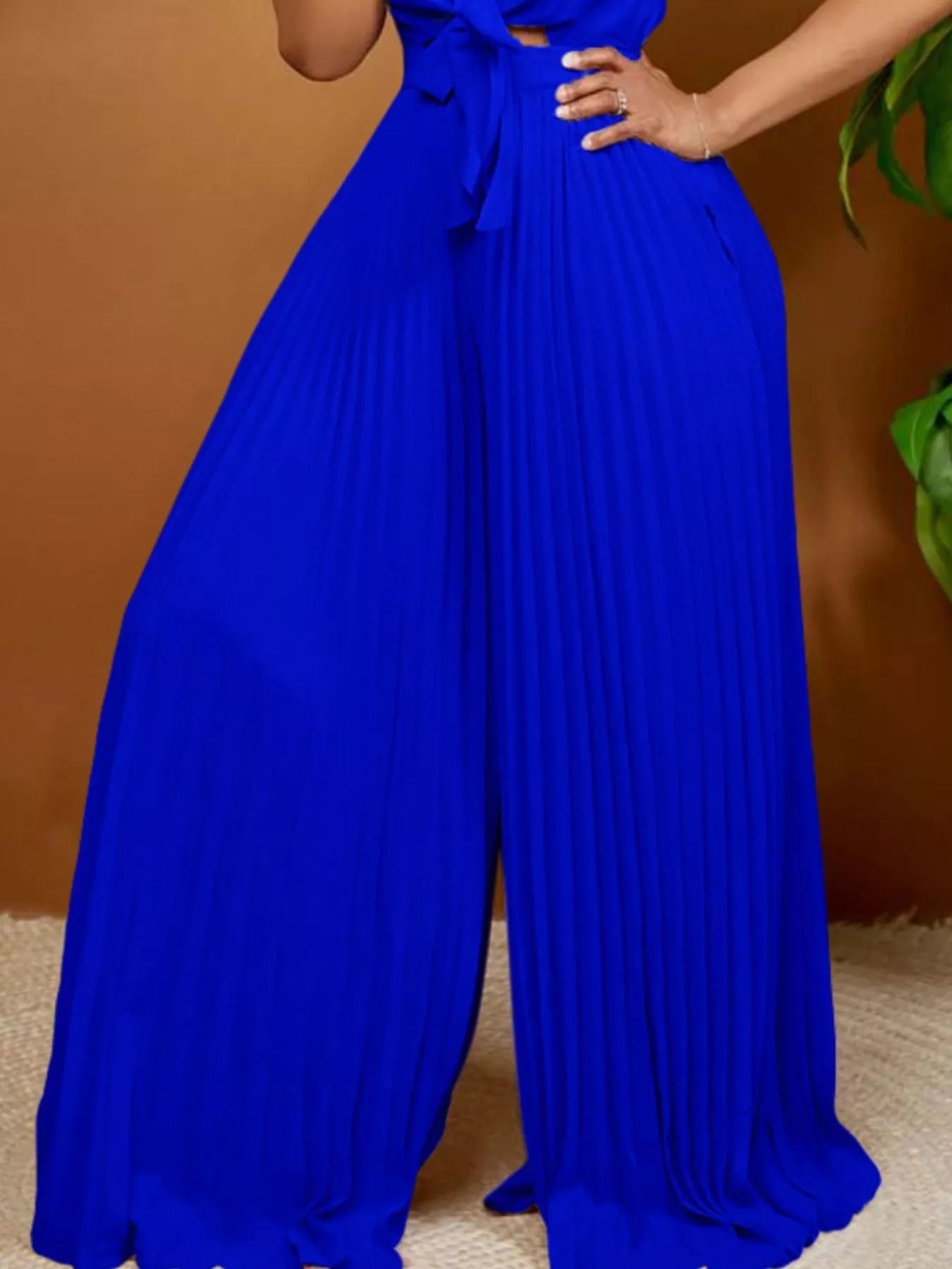 Yellow plus size tie-front pleated wide-leg jumpsuit by Trendsi, full-length front view showcasing the stylish design.