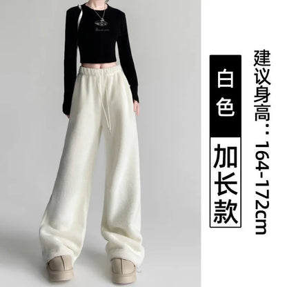 Yellow CozyChic™ winter pants by Vennus Store, warm, loose fit, stylish wide-leg design for cold weather comfort.