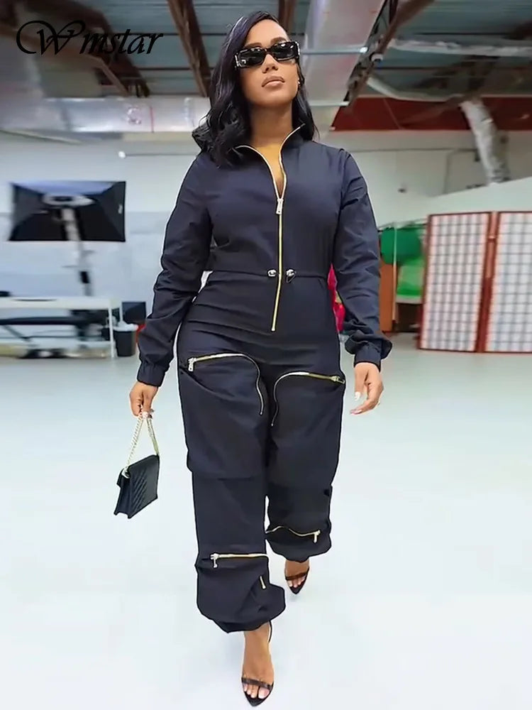 Women Stars Wmstar jumpsuit in solid color, featuring a zipper front, cargo style, and one-piece design for fall fashion.